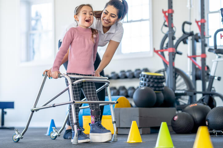 young girl doing physical therapy